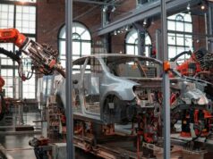 Volkswagen chief urges EU support as carmaker faces major transformation Automobile on an industrial vehicle production line, illustrative image